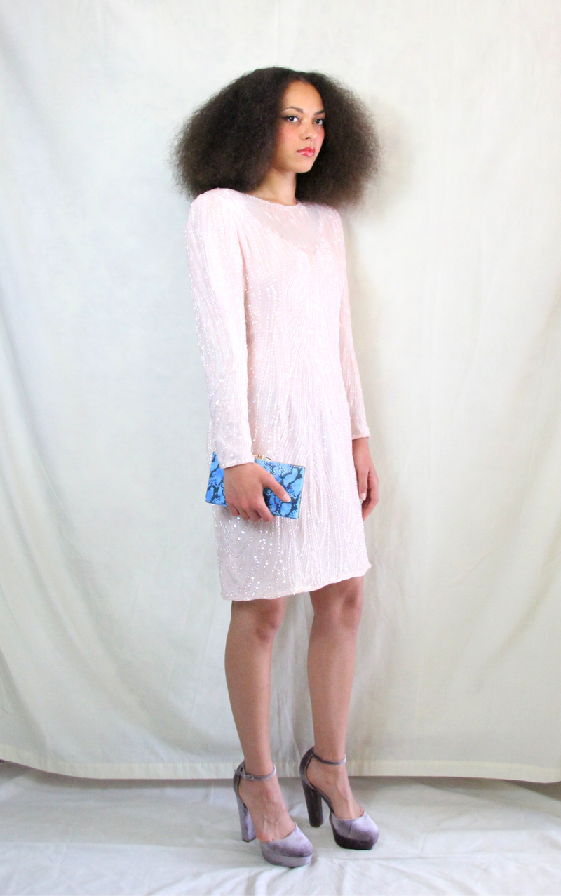 Rent pastel pink vintage sequin dress. Delicate beading and embroidery, with back zipper.