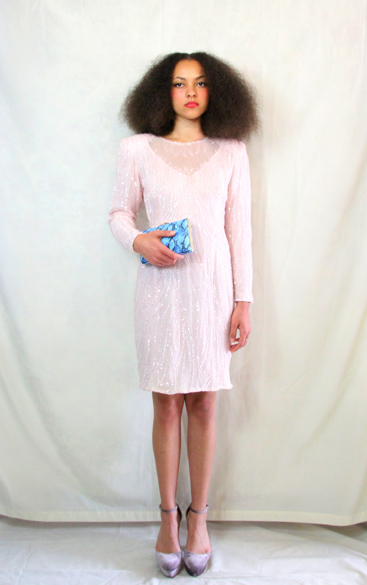 Rent pastel pink vintage sequin dress. Delicate beading and embroidery, with back zipper.