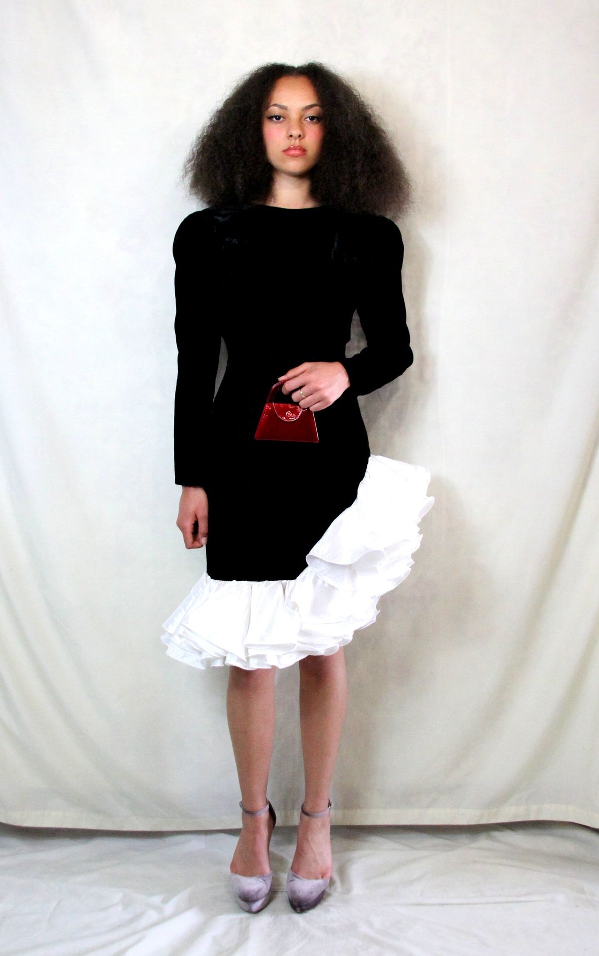 Rent black velvet pencil cocktail dress with exaggerated unique white ruffles