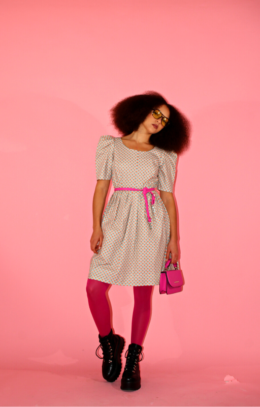 Rent upcycled 1980s inspired skater dress with modern day pleated skirt and green back zip