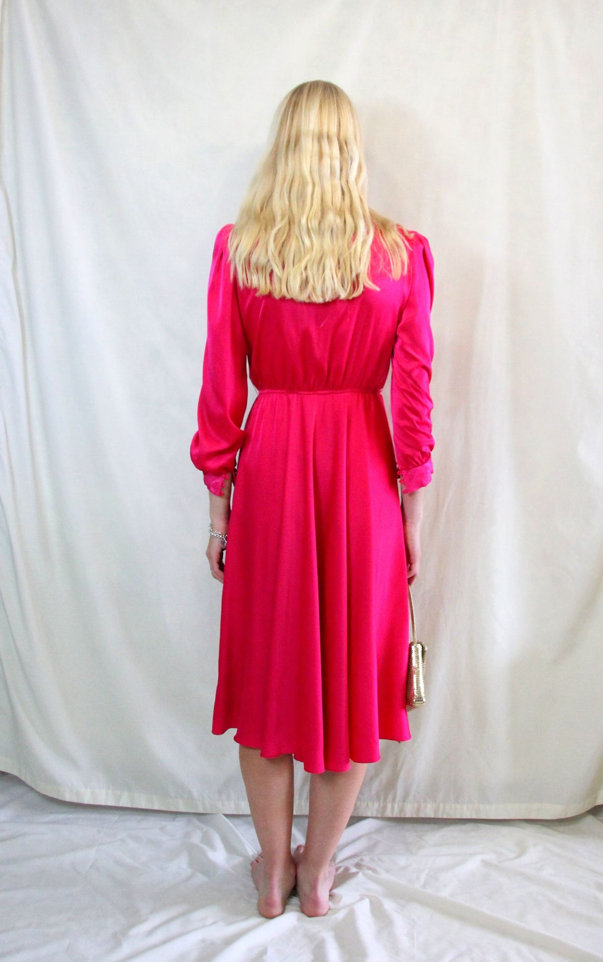Rent Vintage 1940's style midi dress in fuchsia pink material high neck with matching buttons.