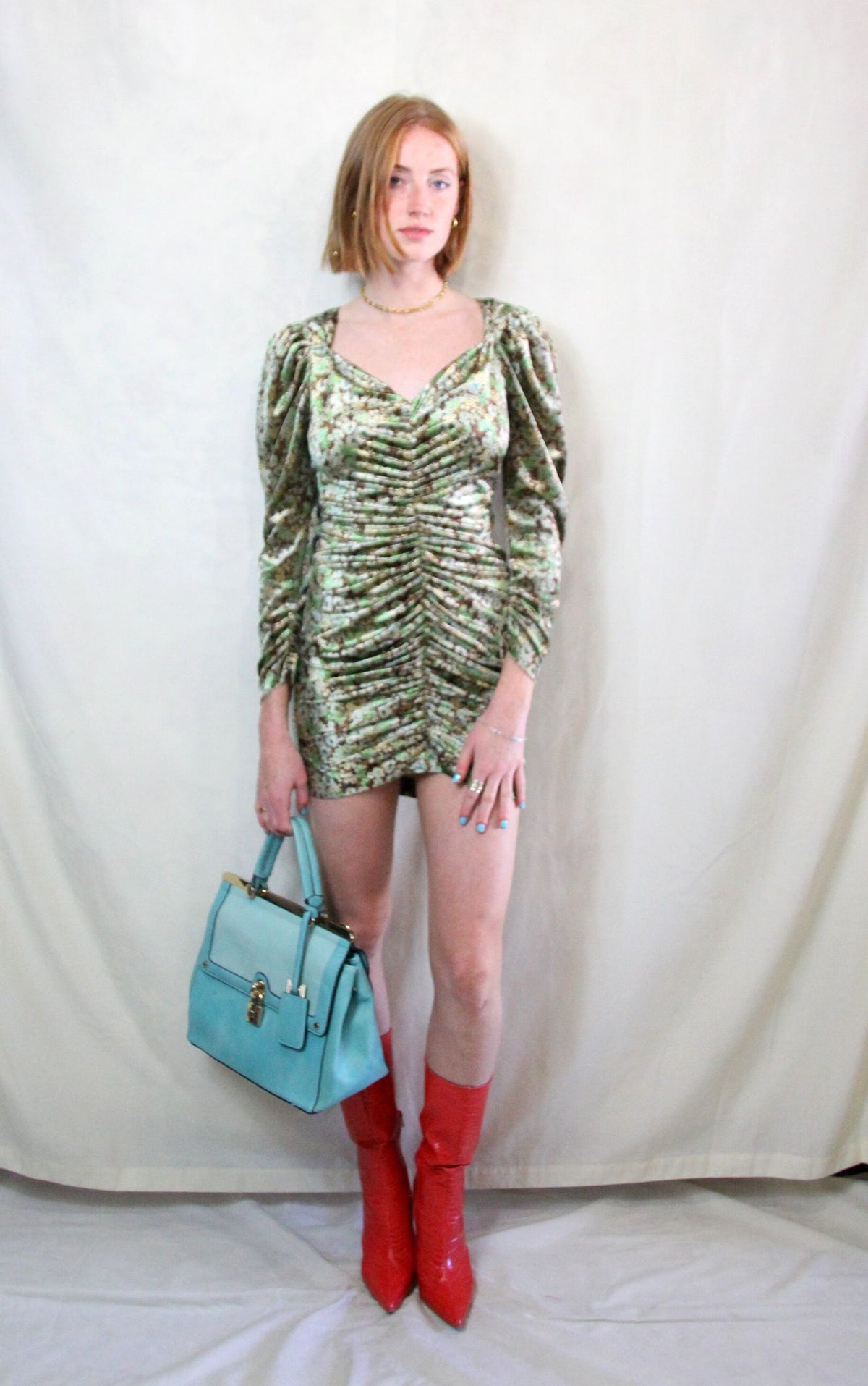 Rent green and gold printed floral long sleeved mini dress