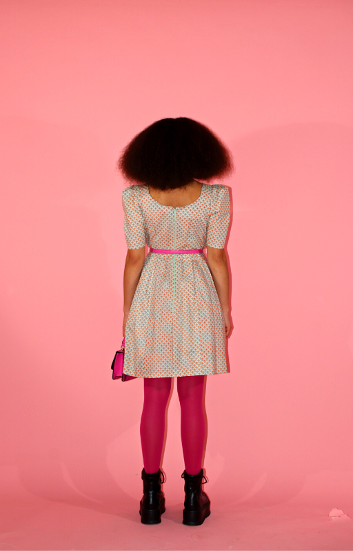 Rent upcycled 1980s inspired skater dress with modern day pleated skirt and green back zip