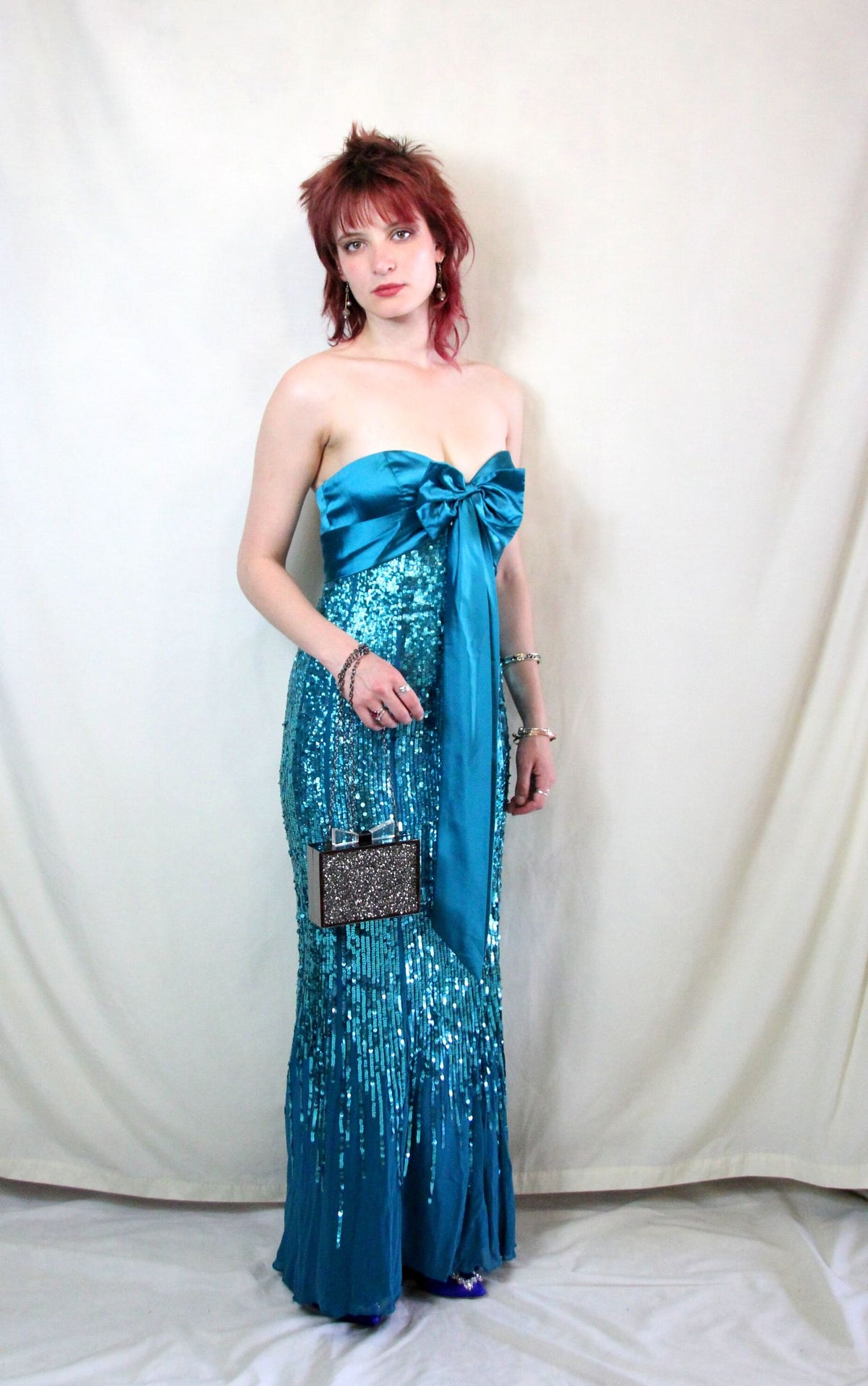 Rent vintage Frank Usher green dress with sequined silk skirt and satin bow front