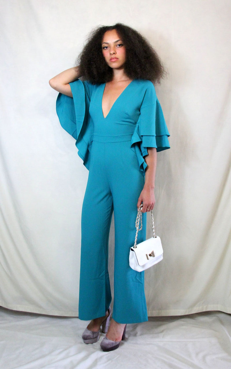 Rent green jumpsuit with plunge neck and back zip to close