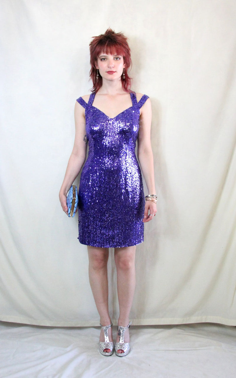 Rent vintage 1970's purple cocktail dress with back zip to close and off the shoulder straps and neck back clasp