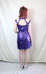 Rent vintage 1970's purple cocktail dress with back zip to close and off the shoulder straps and neck back clasp 