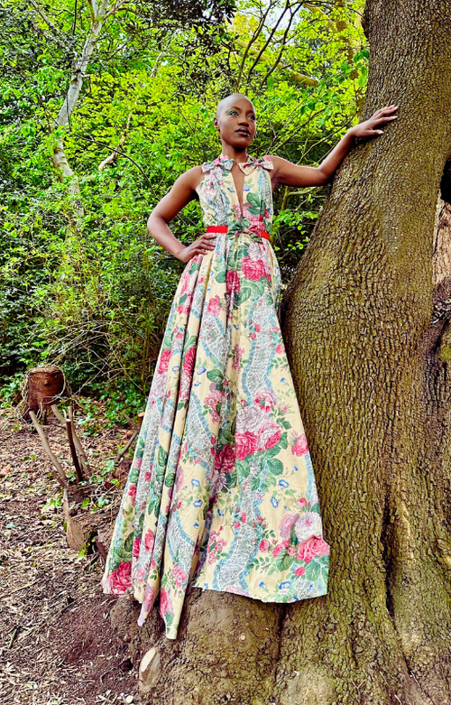 Rent upcycled plunge neck ballgown floral dress in romantic floral print. 