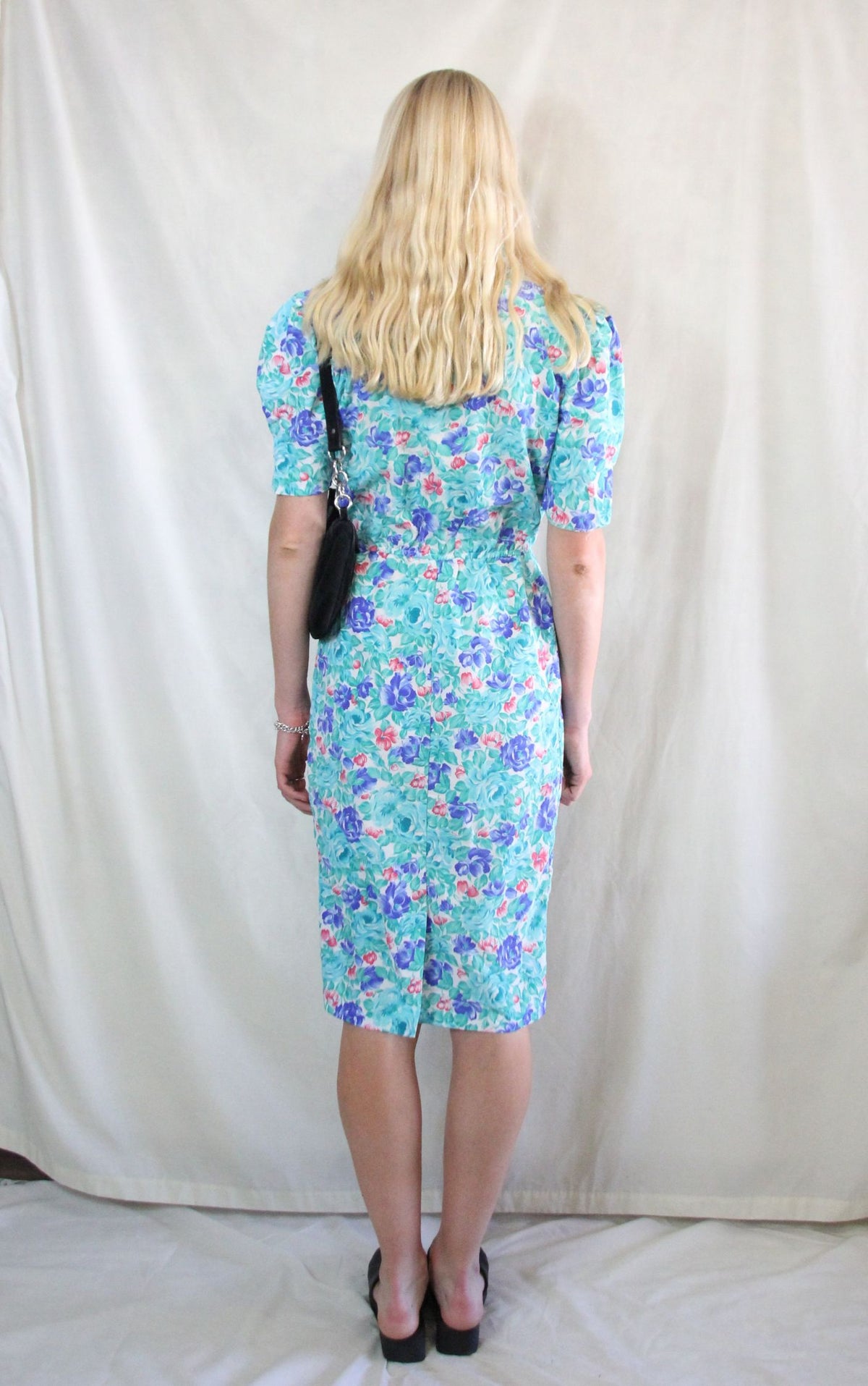 Rent 1950's floral Vintage midi wrap dress in aqua blue, pink and white floral print