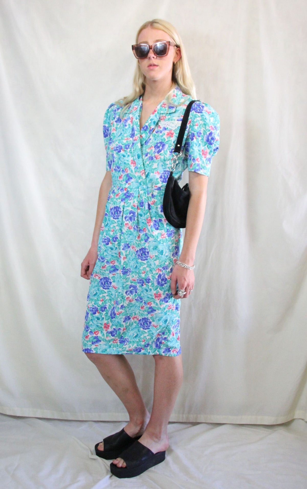 Rent 1950's floral Vintage midi wrap dress in aqua blue, pink and white floral print