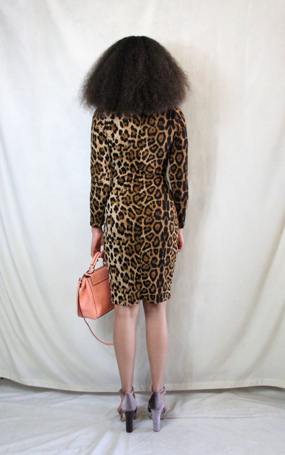 Knitted leopard print pencil dress with long sleeves and back zip