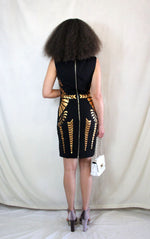 Rent Black pencil dress with gold gladiator print and back zip 