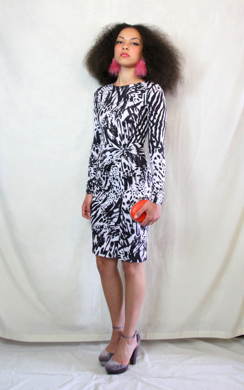 Rent psychedelic pencil dress in black and white animal print with long sleeves