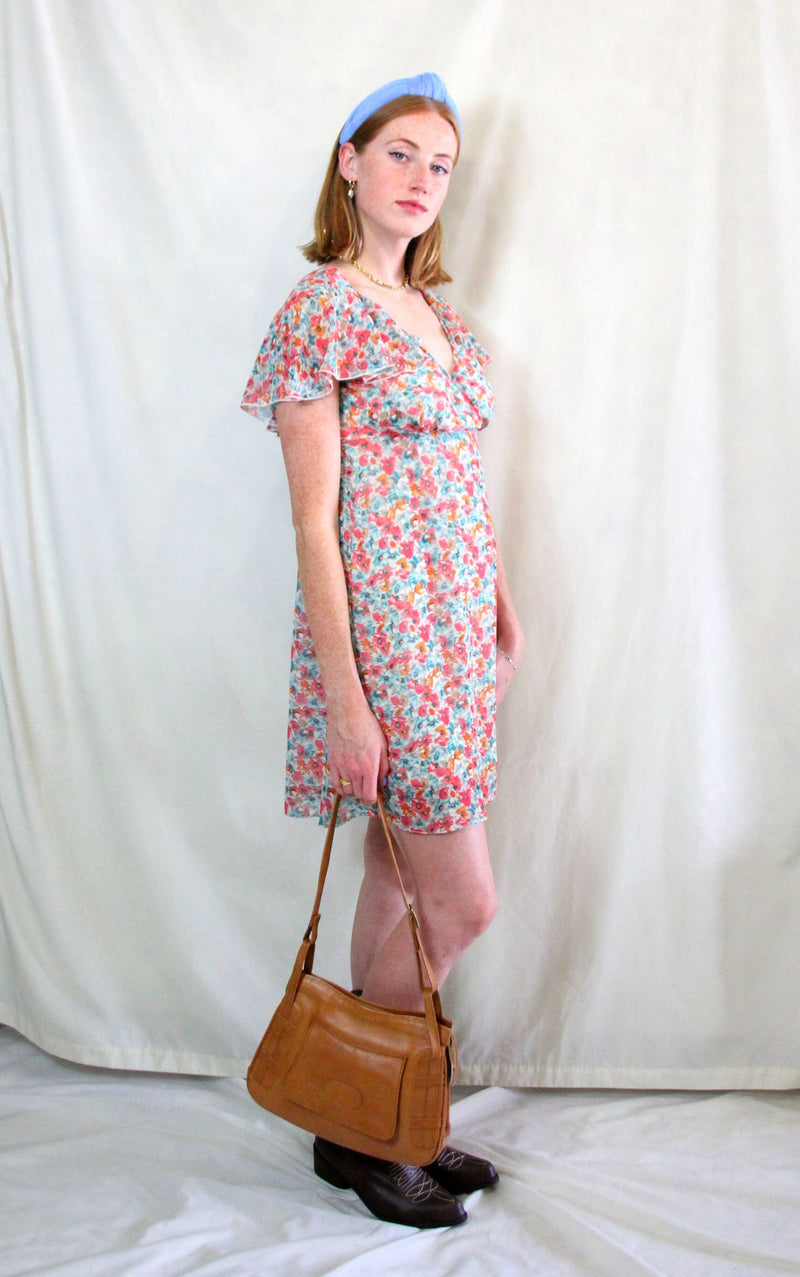 Vintage floral tea dress with bib collar and wrap front in pink and blue floral print