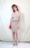 Nude open front bandage dress with cross front detail and back zip