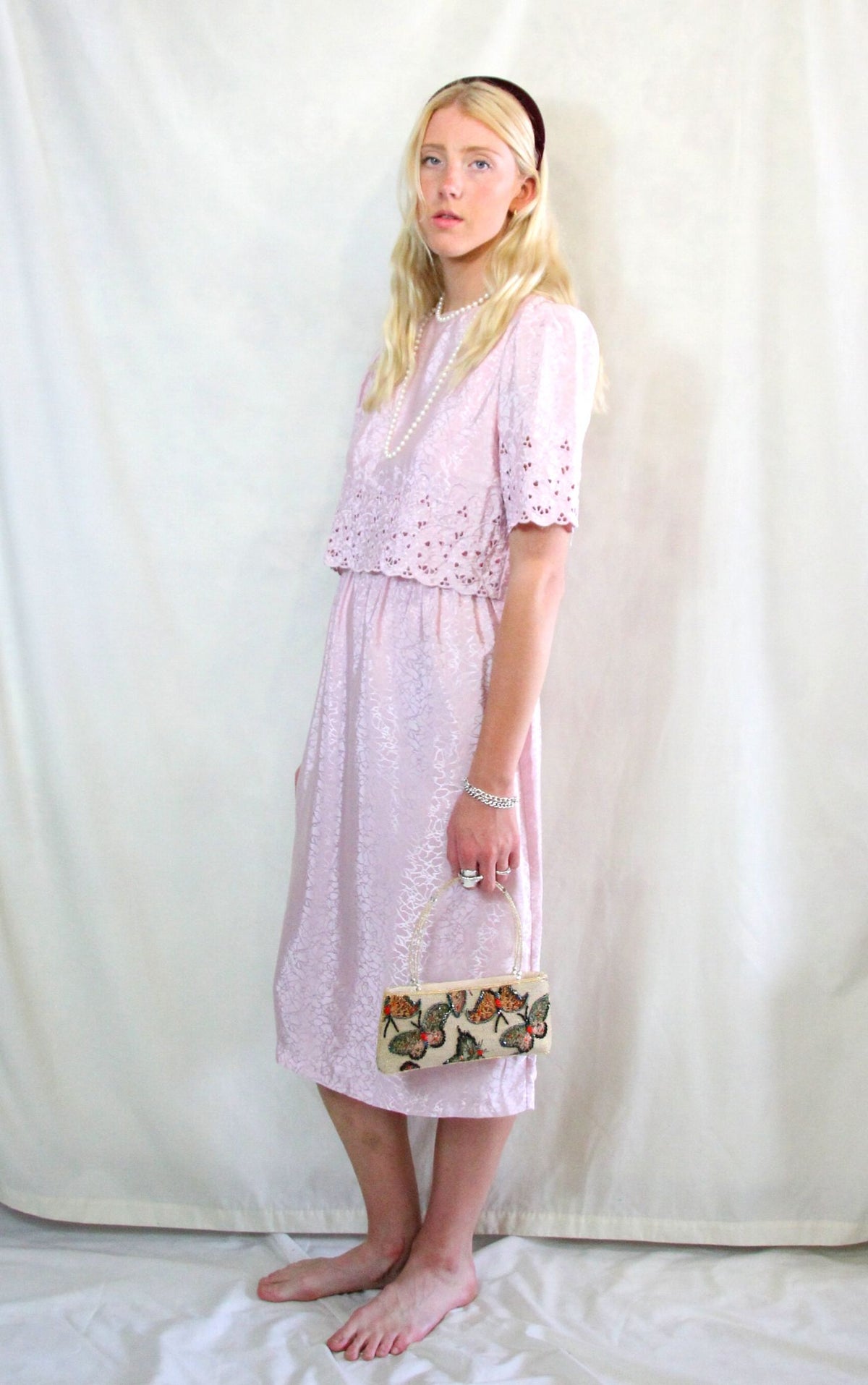 Rent vintage pastel pink tea dress with elasticated waist and top button to close