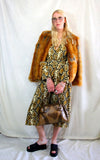 Rent 70's inspired snake print dress with matching belt