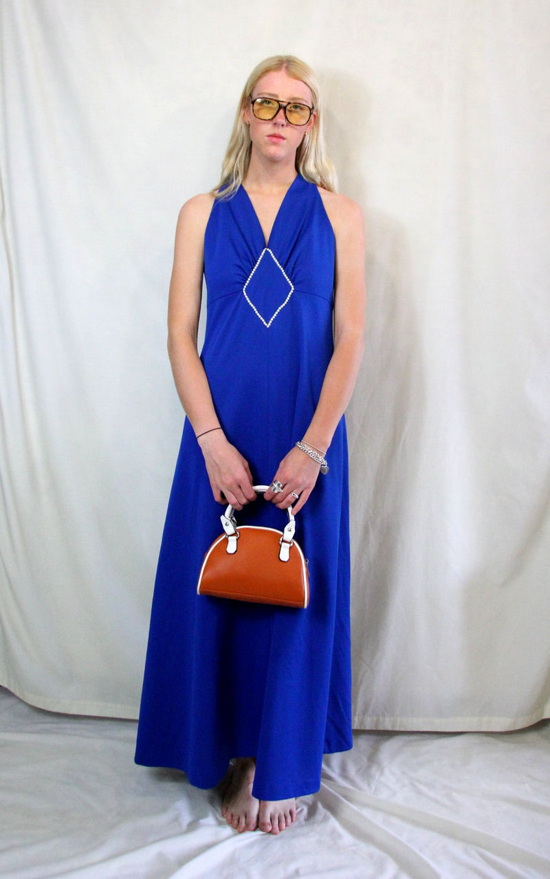 Rent vintage 1970's cobalt blue maxi dress with front pearl detail and back zip