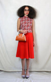 Rent Vintage 1960's mod dress with woven aztec top and bright red pleated skirt 