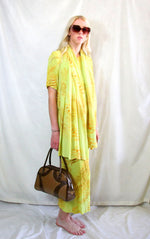 Rent vintage yellow printed three piece outfit. Skirt, top and matching scarf 