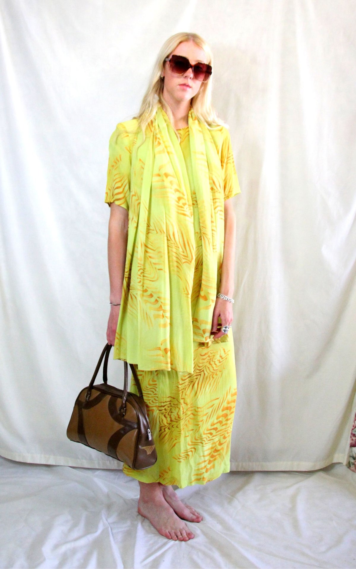 Rent vintage yellow printed three piece outfit. Skirt, top and matching scarf 