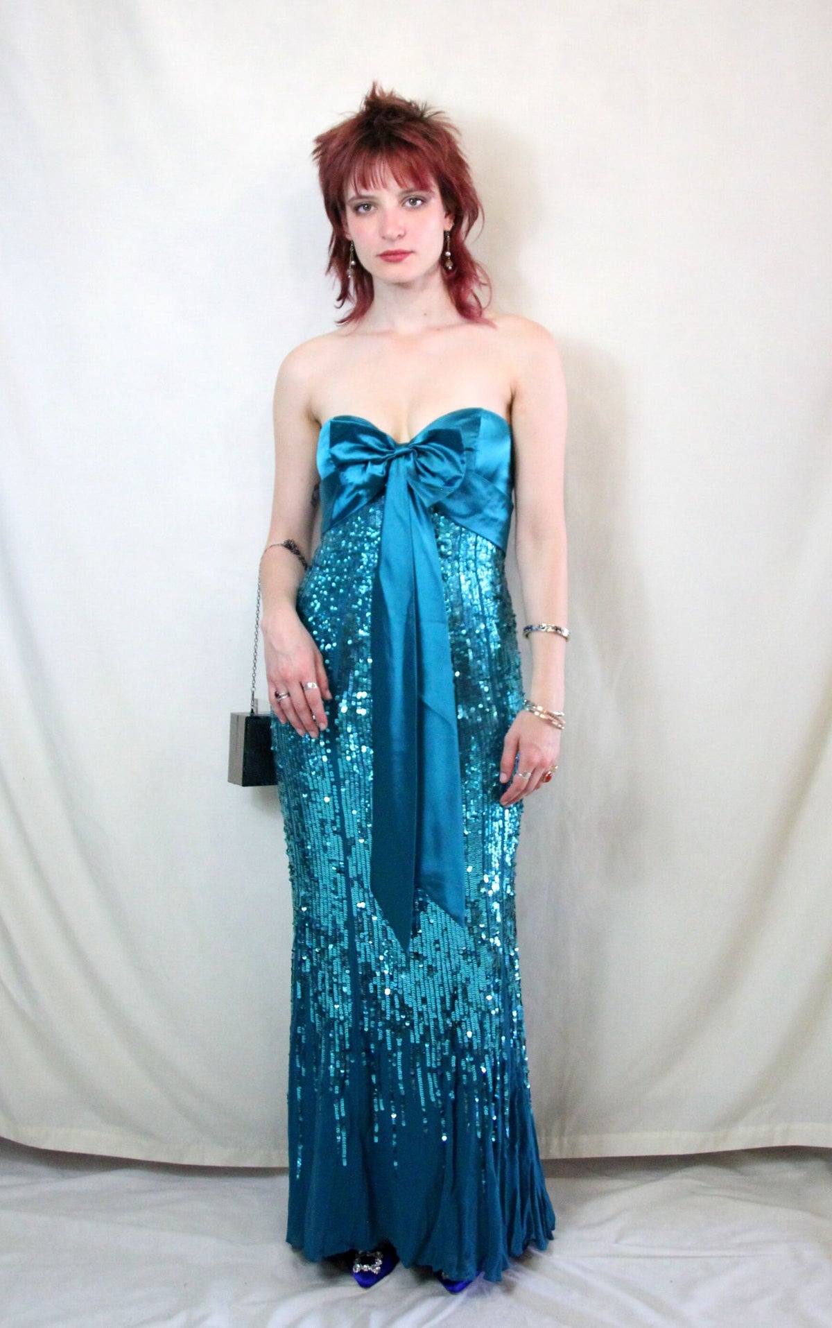 Rent vintage Frank Usher green dress with sequined silk skirt and satin bow front