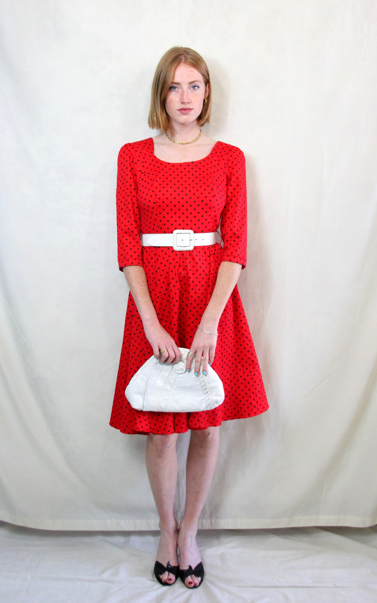Rent 1950s swing dress in bright red and navy spot print
