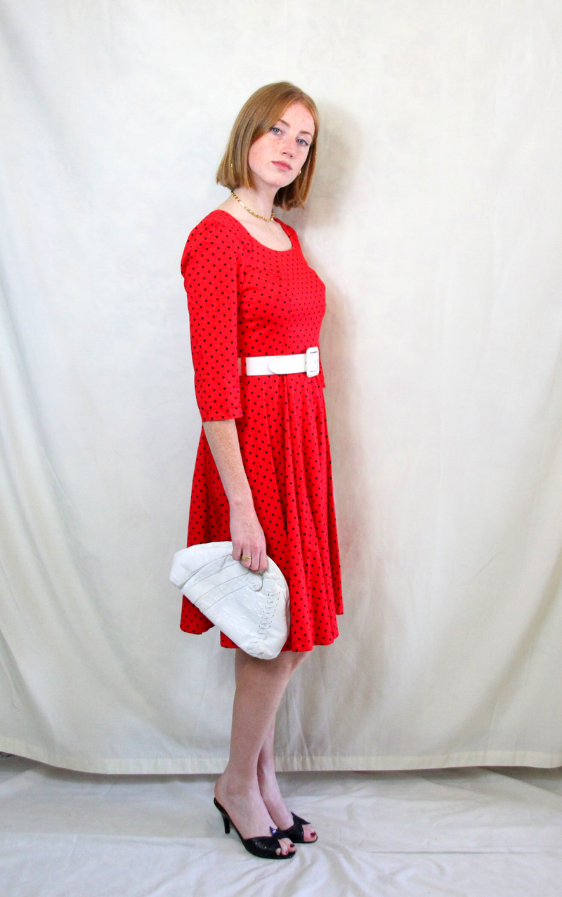 Rent 1950s swing dress in bright red and navy spot print
