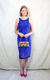 Rent cobalt blue midi caged dress in body con fit with back zipper to close 