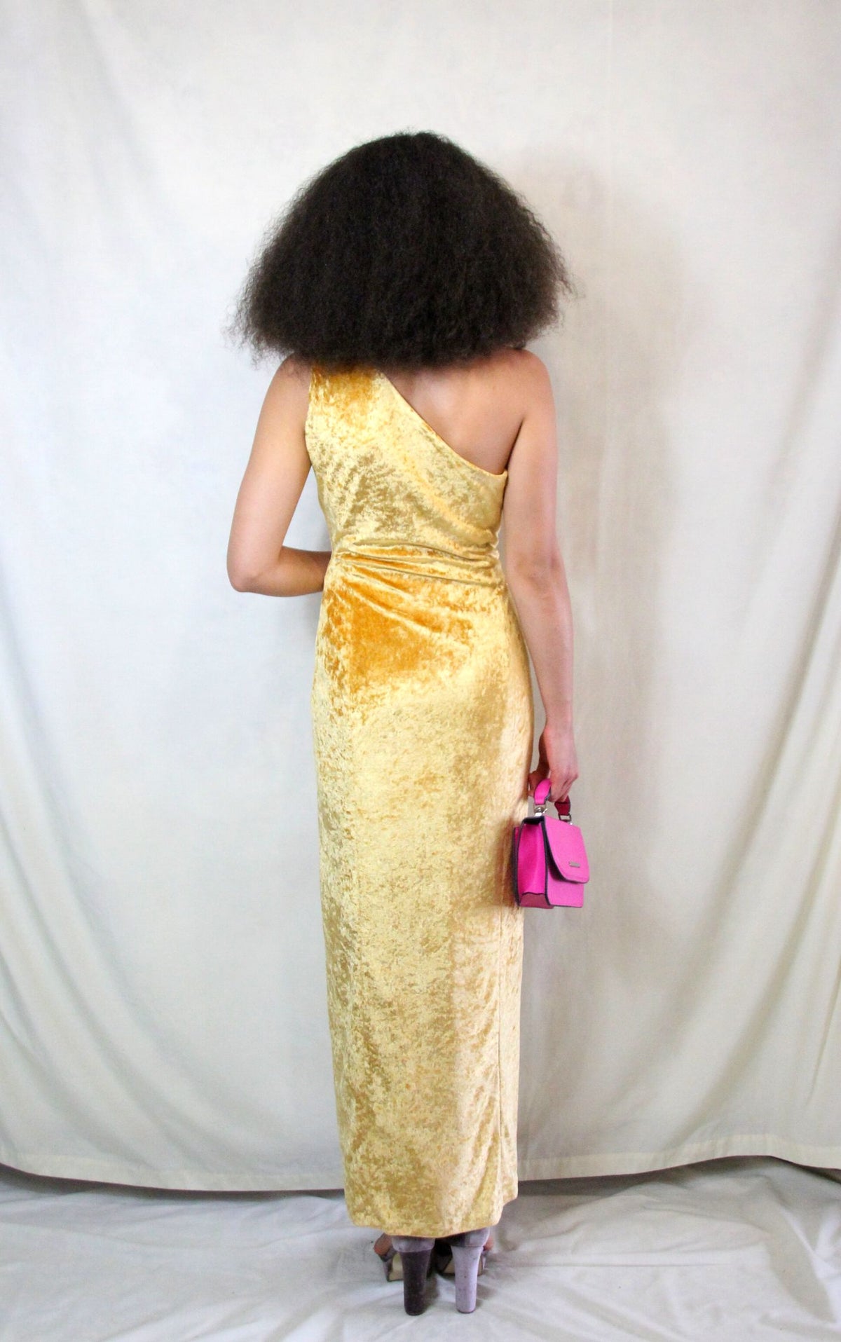 Rent custom made yellow gold maxi dress with front split and one shoulder detail