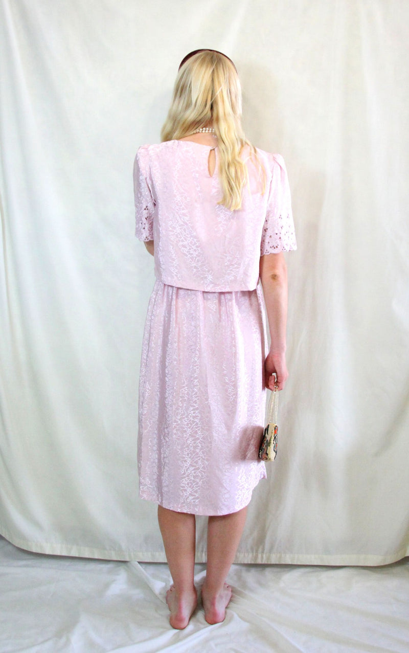 Rent vintage pastel pink tea dress with elasticated waist and top button to close