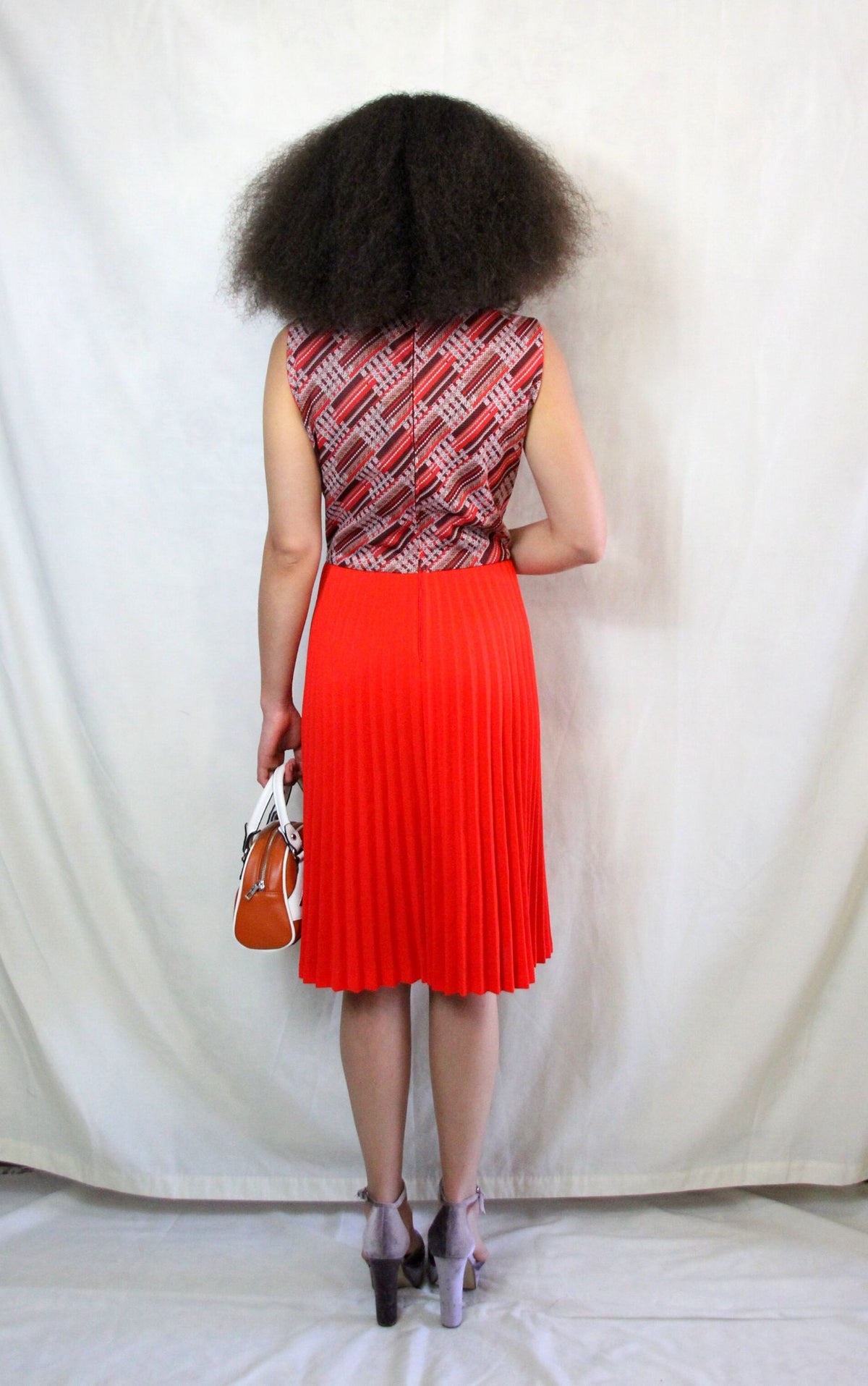 Rent Vintage 1960's mod dress with woven aztec top and bright red pleated skirt 