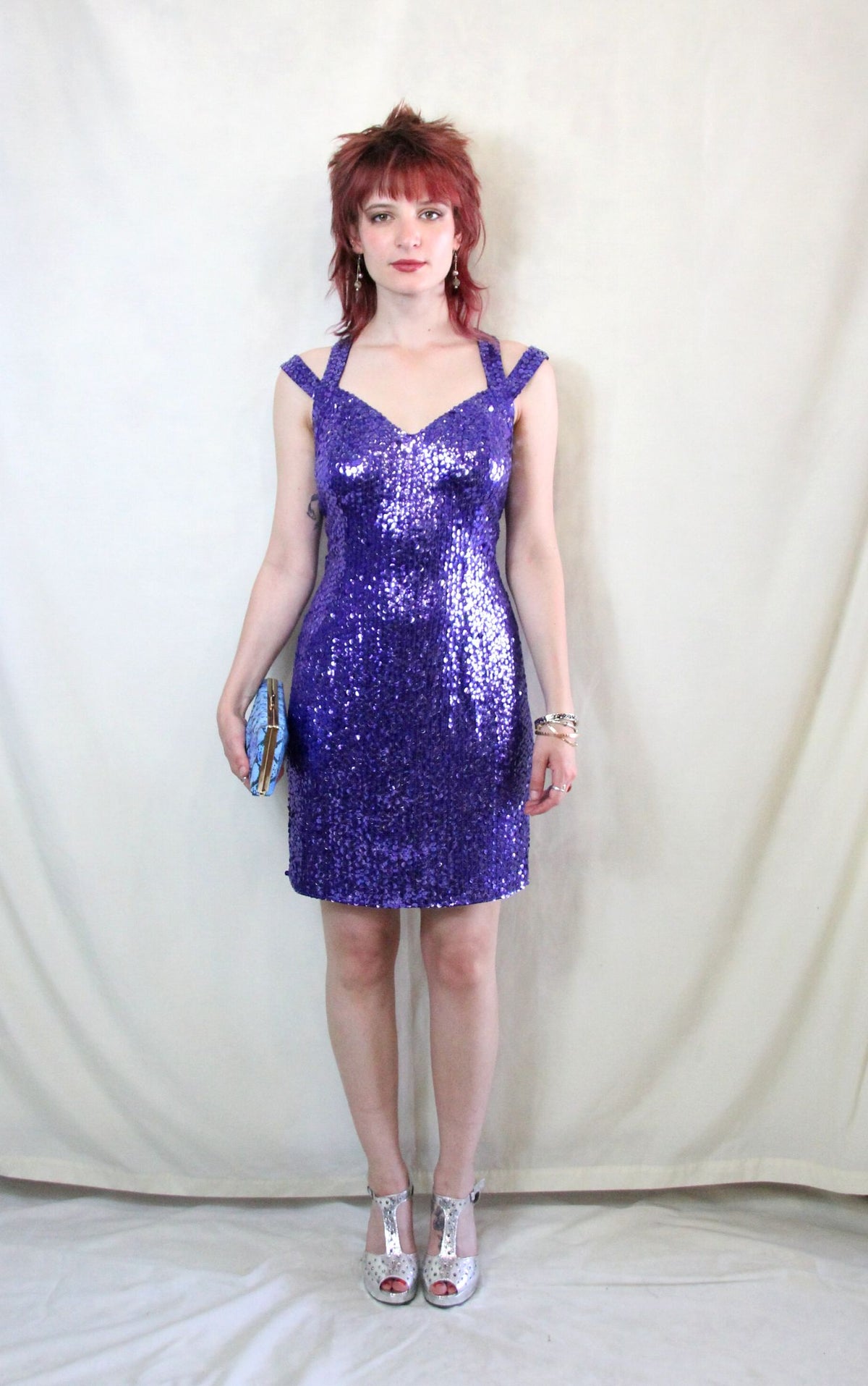 Rent vintage 1970's purple cocktail dress with back zip to close and off the shoulder straps and neck back clasp 