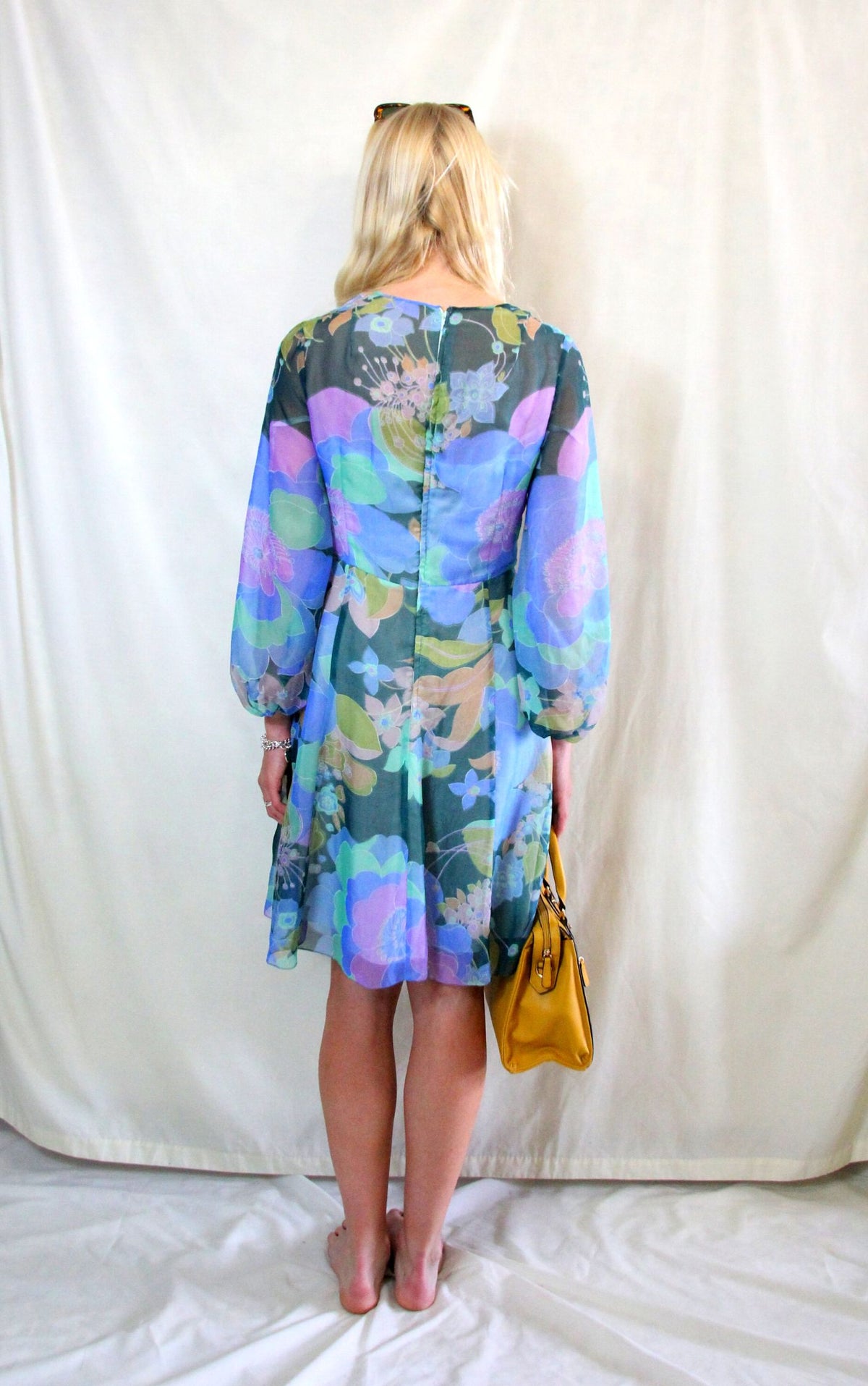 Rent 1970s flower power, blue green and pastel large floral print midi dress with balloon sleeves