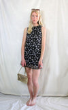 Rent 1960s style retro mini dress with large black and cream floral print