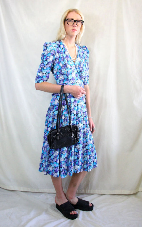 Rent vintage blue tea dress with shoulder pads and back tie
