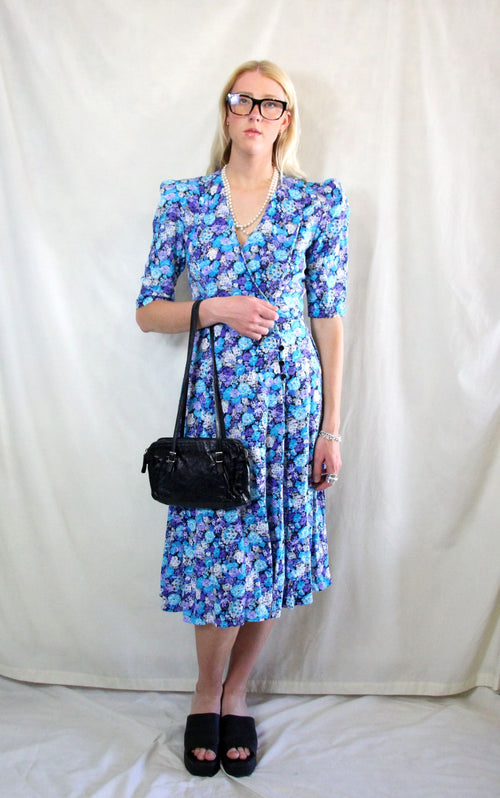Rent vintage blue tea dress with shoulder pads and back tie