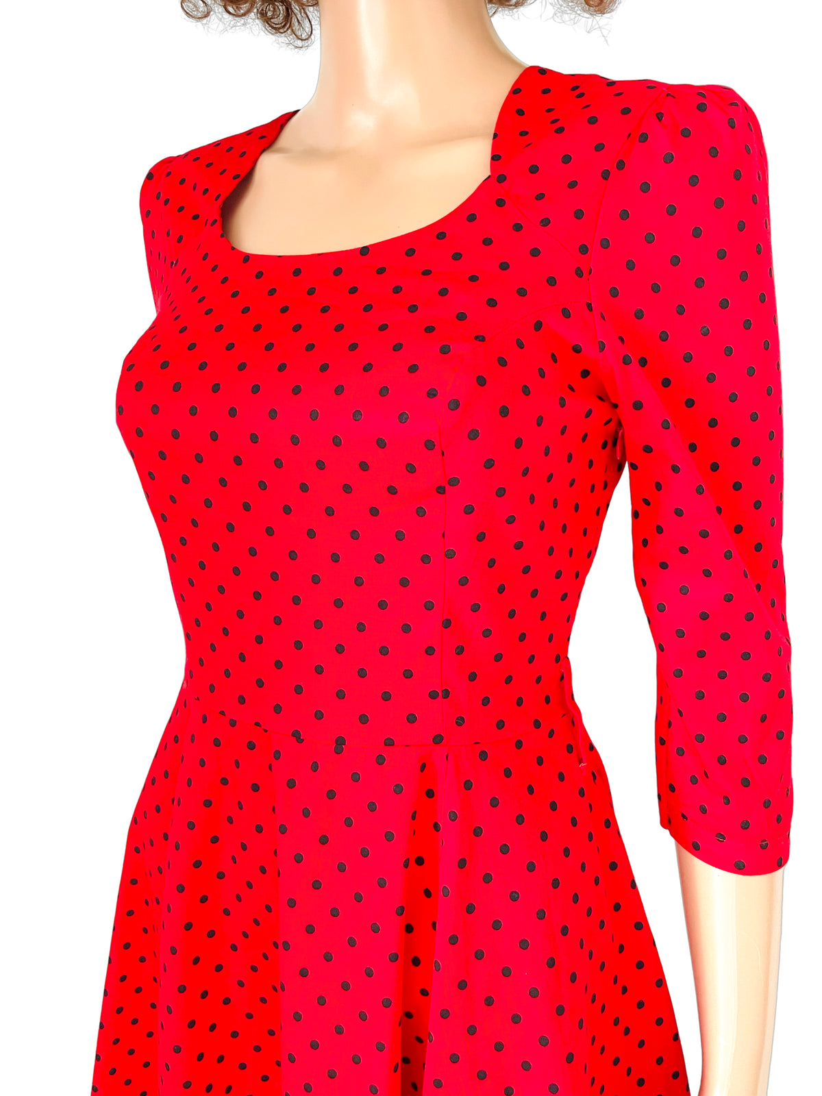 Rent 1950s swing dress in bright red and navy spot print