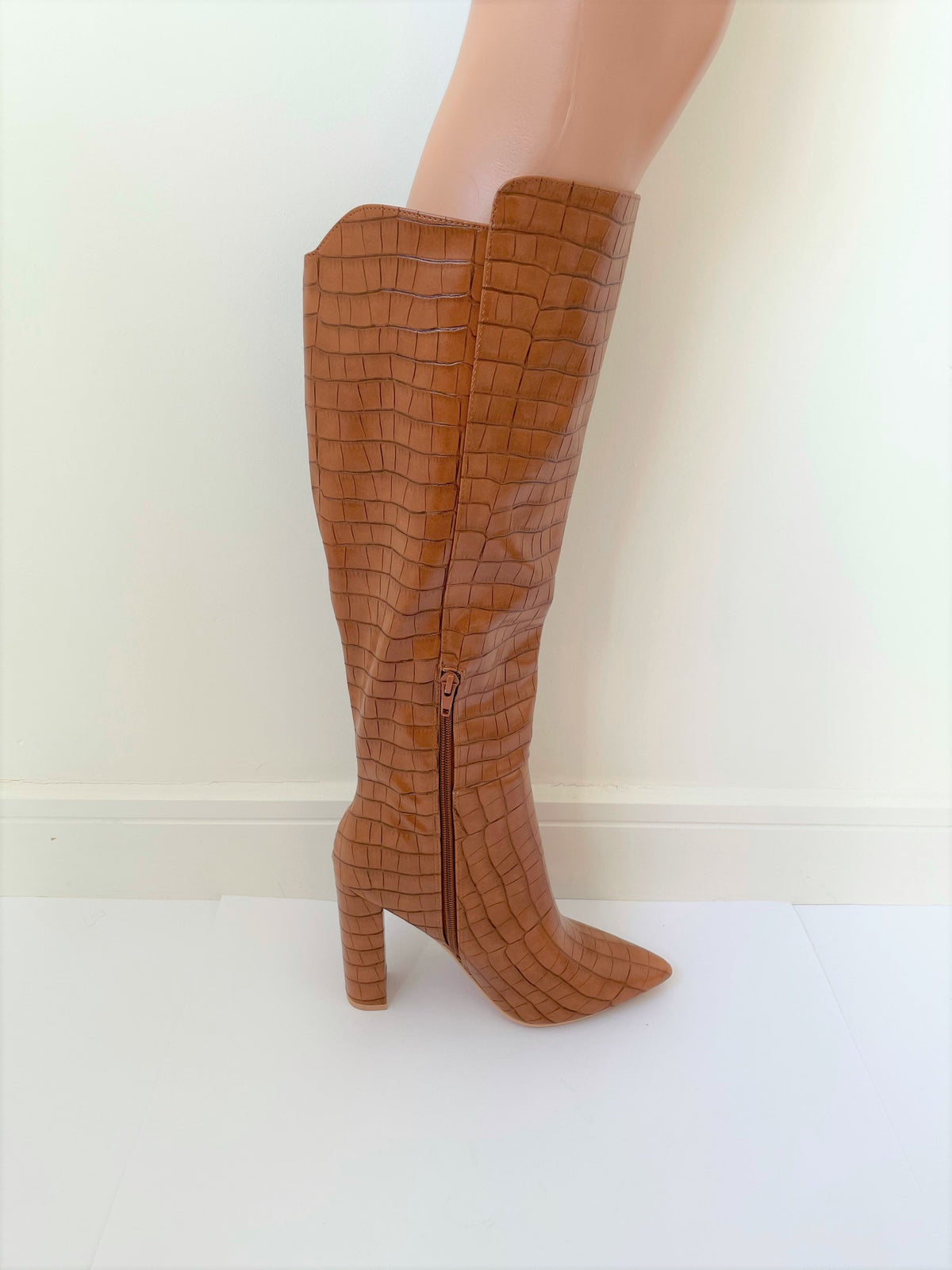 rent tan knee high croc boots