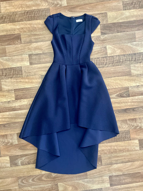 Rent navy blue prom dress with sweetheart neck and back zip to close 