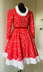 Rent Red and White skater snowflake Christmas Dress custom made for Elf The Musical and worn on stage at the Bristol Hippodrome
