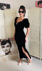 Rent Vintage Velvet Maxi DressRent Couture Vintage black maxi dress with sweetheart neckline and structured shoulders. Back zip and subtle split finished off with a delicate and timeless front pearl style brooch 