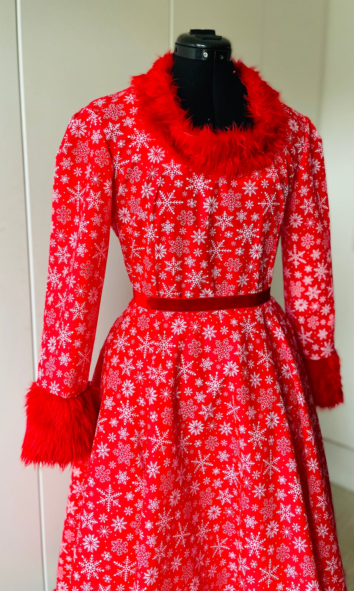 Rent Red and White skater snowflake Christmas Dress custom made for Elf The Musical and worn on stage at the Bristol Hippodrome